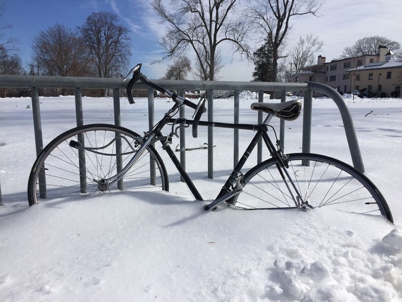 Snow-engulfed bike Wesleyan